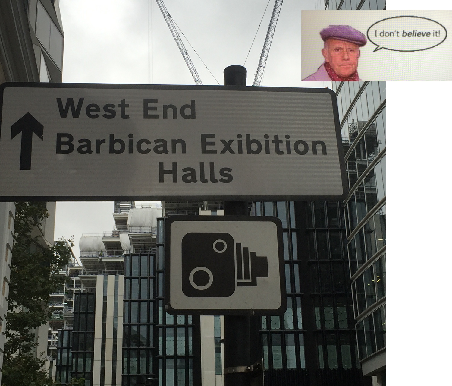 Mispelled sign for "Barbican Exhibtion Halls". The "h" is missing from the workd exhibtion!