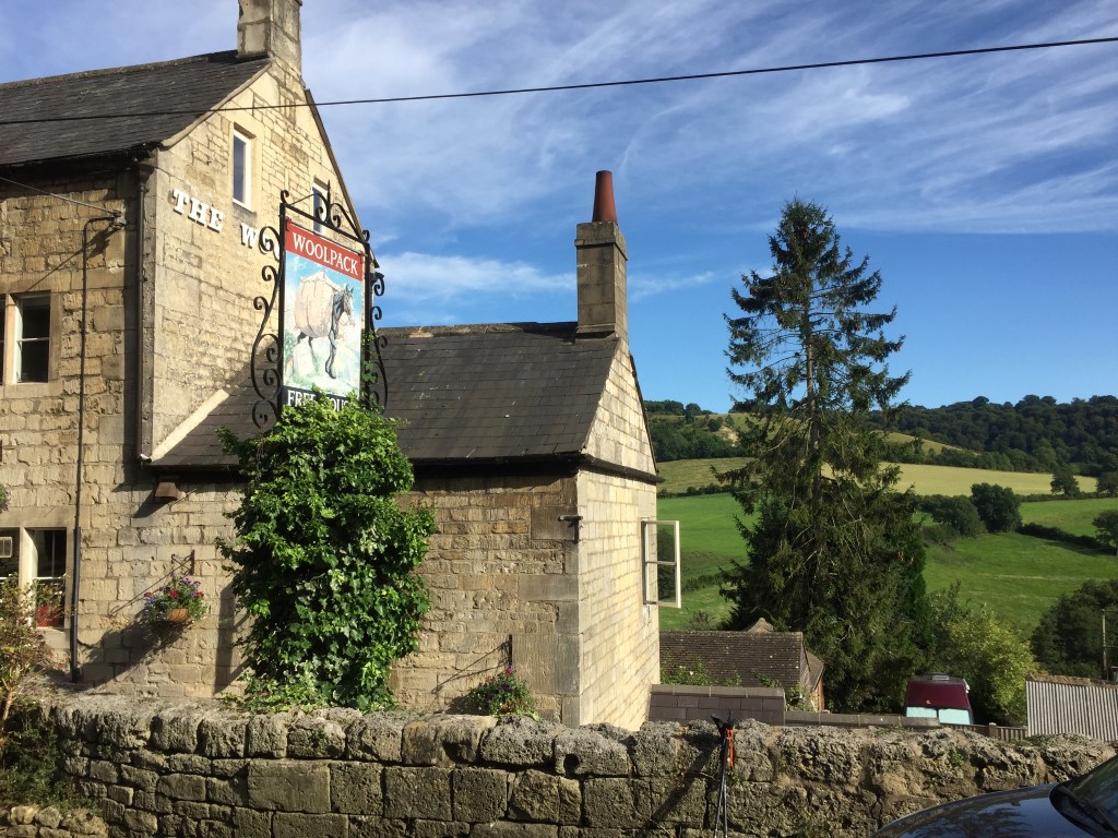 Laurie Lee: The Woolpack at the start of the walk with Swifts Hill behind the pine tree near the end.