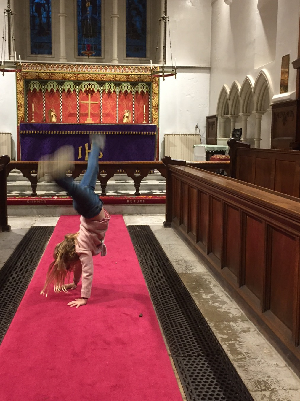 Let There be Light: Daisy-Mae cartwheeling between the choir stalls.