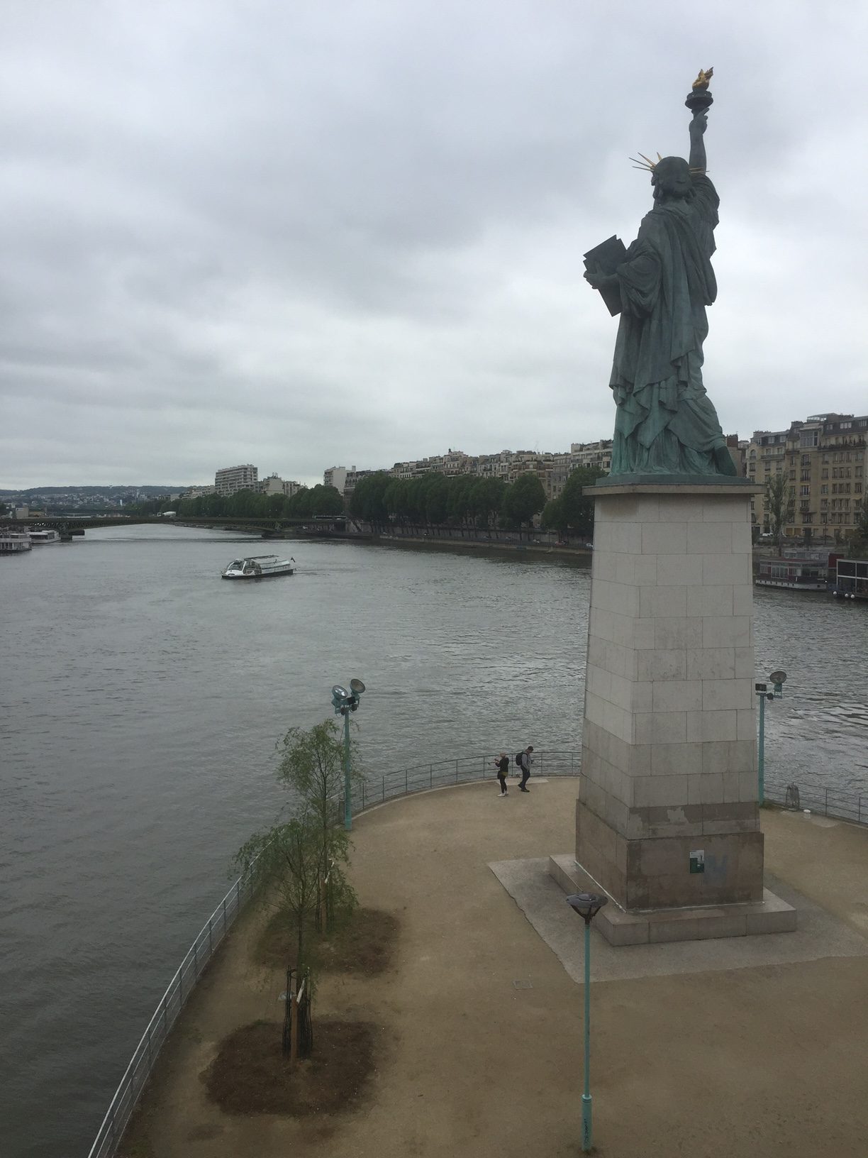 Paris: Replica Statue of Liberty, near the Grenelle Bridge on the Île des Cygnes, an island in the river Seine. 11.50 m (37 feet 9 inches) high. Said to face her larger sister in New York.