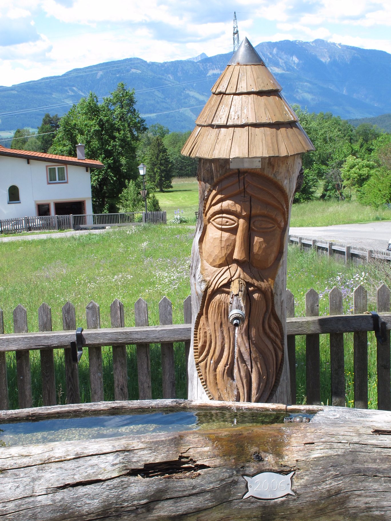 Austria: They do love their wood sculptures in Austria. Even a water trough.