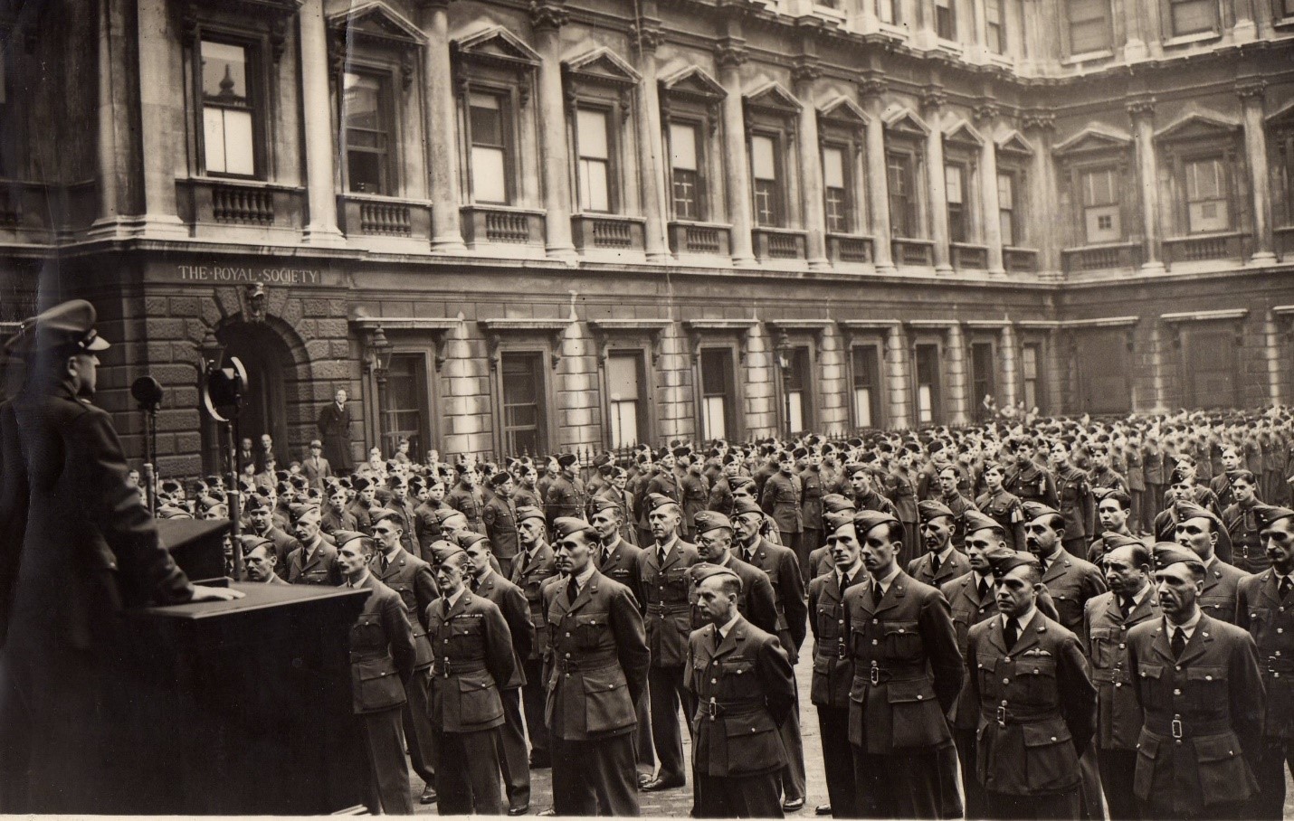 Ernie's War: Large ATC event about 1941 at Royal Society Court, Burlington House, Piccadilly, London. Ernie is shown middle of front row in enlarged section above.