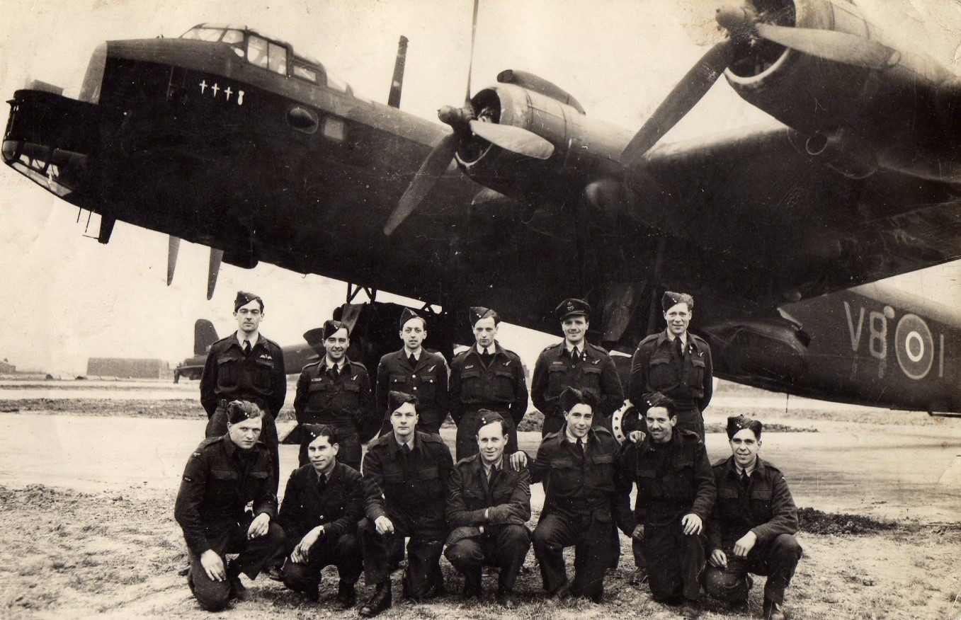 Ernie's War: Air and ground crew. Ernie is shown, third from left bottom row with his friend Paddy first left on that row. Peter Shuter the Flight Lieutenant fifth from left top row.