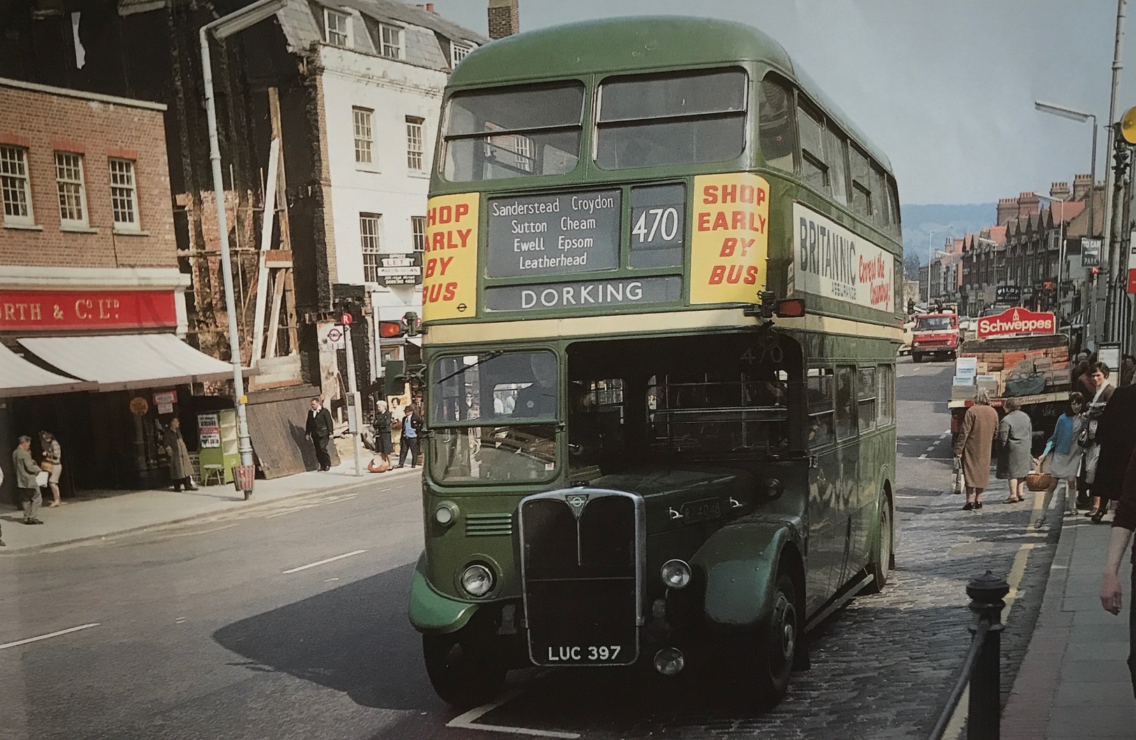 The Bench: Dorking High Street 1969….. The 470 (notice Woolworths). Those were the days. Take note of the sign board on the bus.
