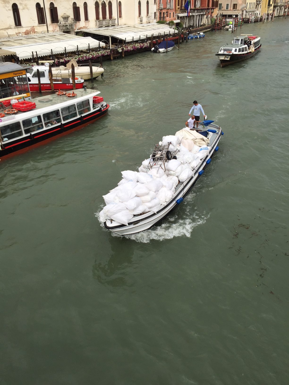 Venice: I wonder what's in those bags?