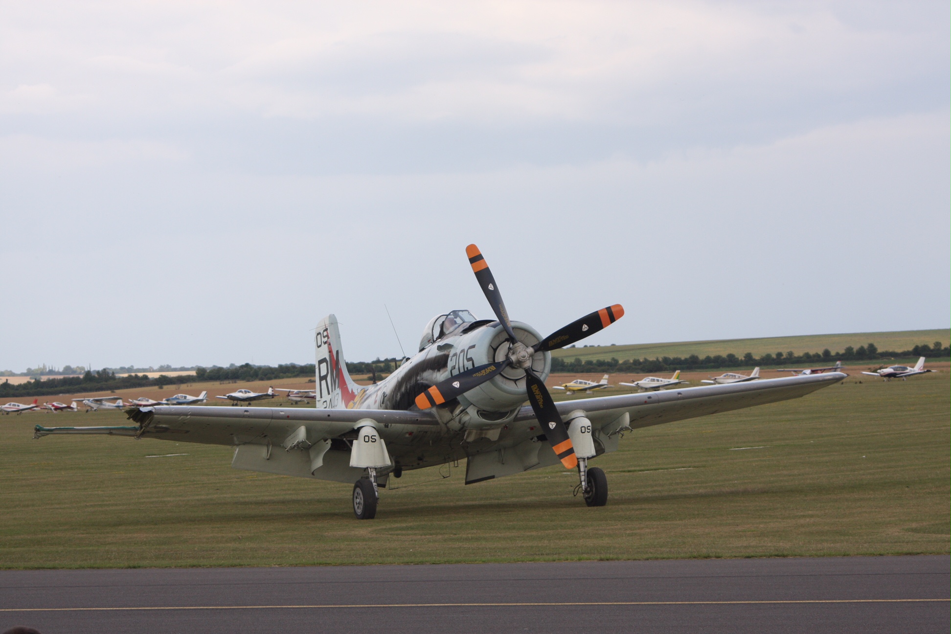 Flying Legends Duxford. Skyraider. Notice how much wing is missing, yet it still landed safely.