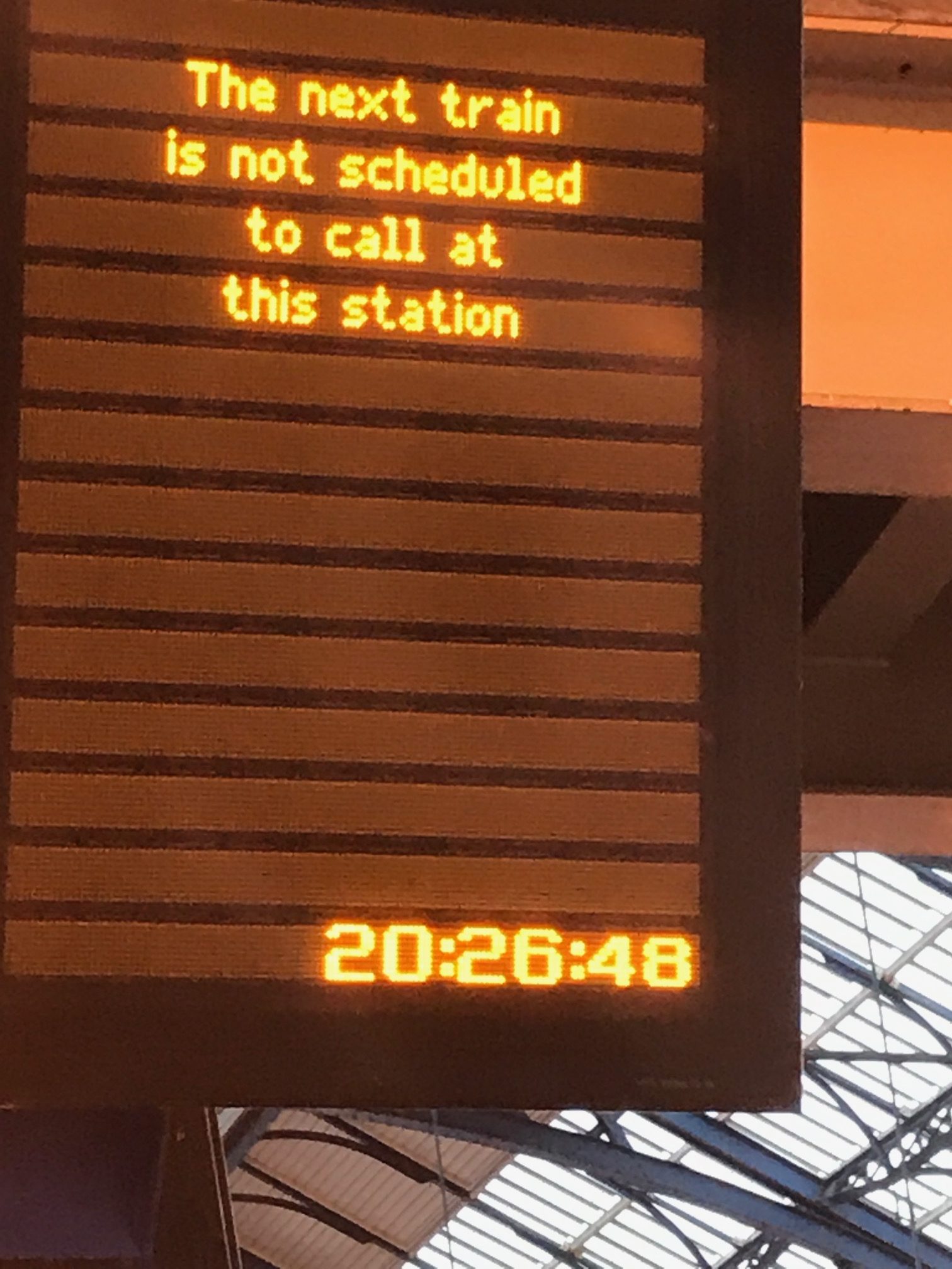 Brighton: Sign reads: "The next train is not scheduled to call at this station"!