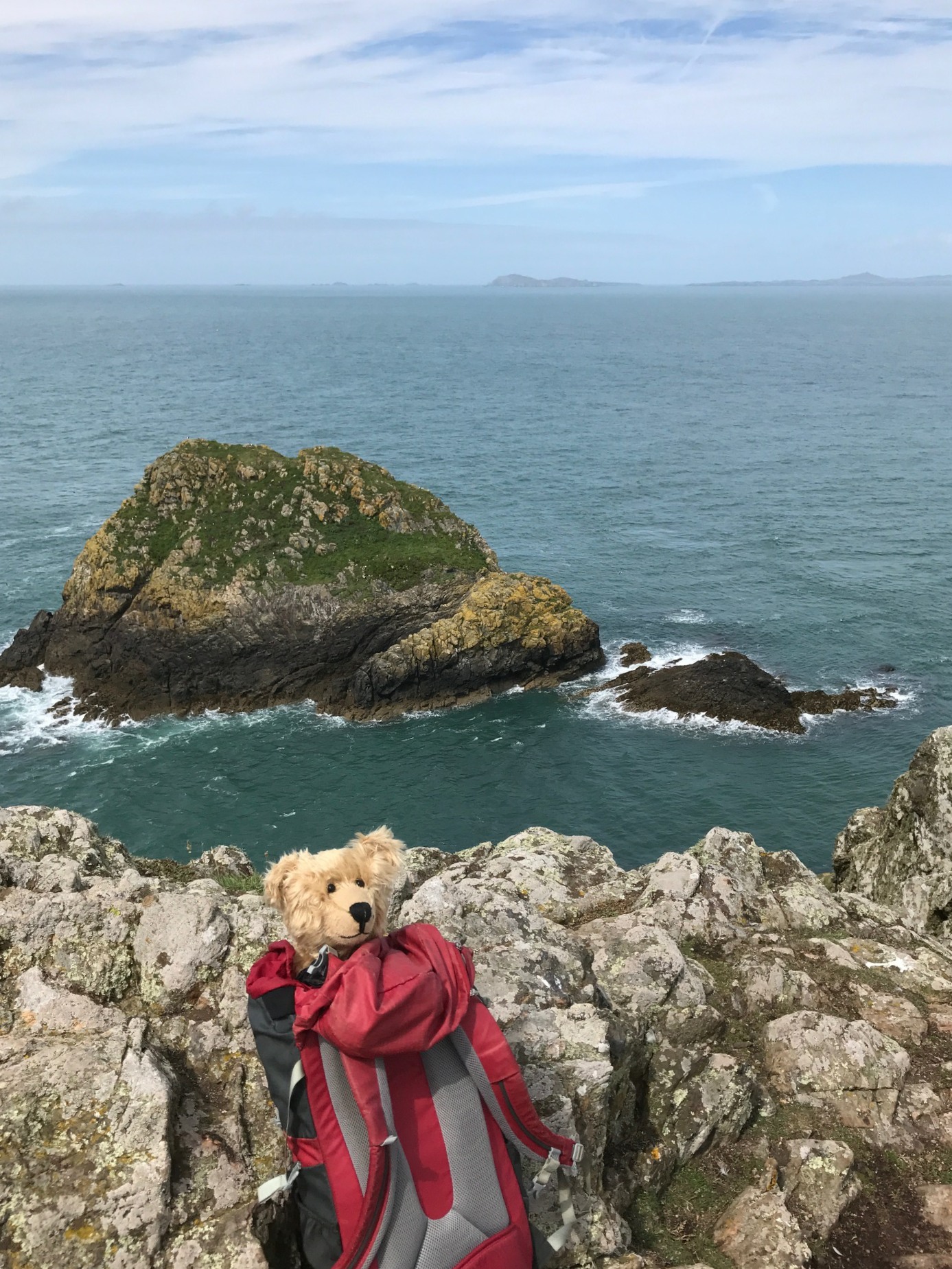 Giselle Eagle: The Garland Stone. Most northerly point of Skomer. Looking across St Brides Bay to Ramsay Island and the St David's Peninsular.