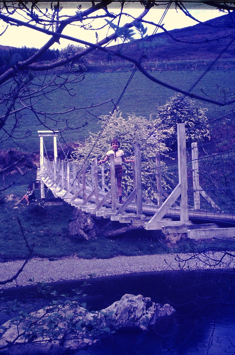 Gigrin Farm: Suspension footbridge, River Wye, 1973. Bobby's son Andrew.