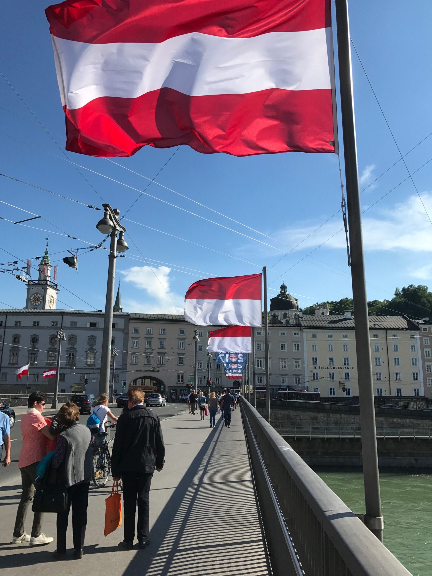 Salzburg: The main river bridge. See the trolleybus wires.