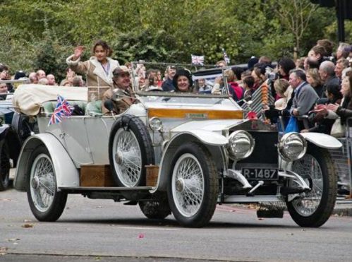 Special One: And finally, or rather now at last, a Princess in that wonderful car. Treated like royalty by Tim and Susie in front. The King is thereabouts in the back, acknowledging his subjects. In case anyone came from Mauritania.