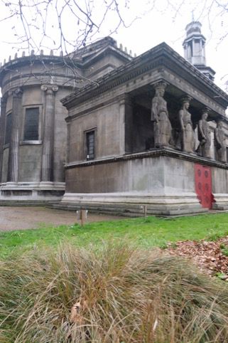 Trevor and Henry: Lighting a Candle for Diddley - St Pancras New Church Statues.