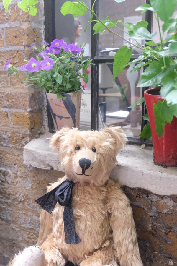 One Hundred: Townhouse courtyard … tea and cakes.