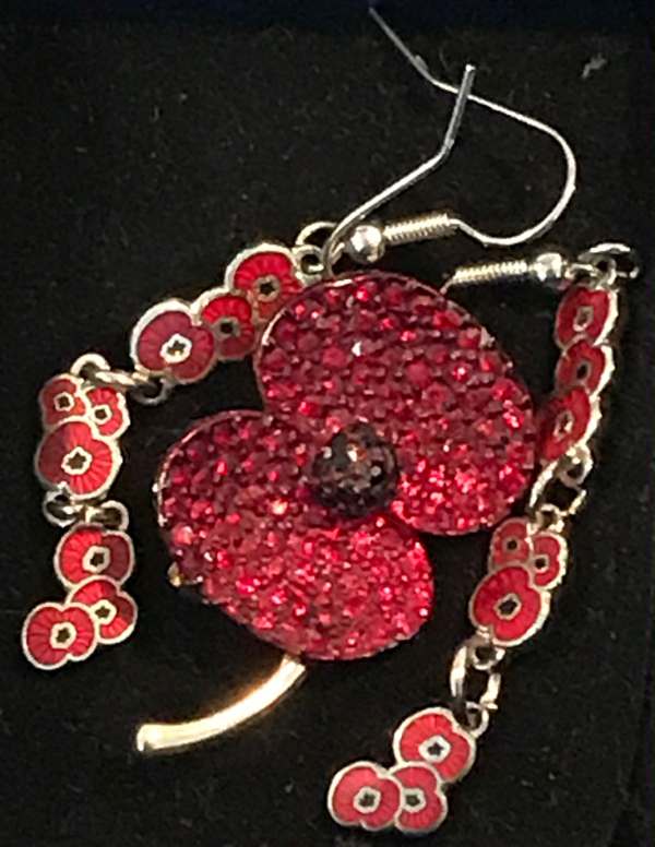 Remembrance Day: Diddley wanted a very special poppy and chose this enamelled brooch and ear rings. She would be delighted to know that they are in safe keeping with her granddaughter Layla.
