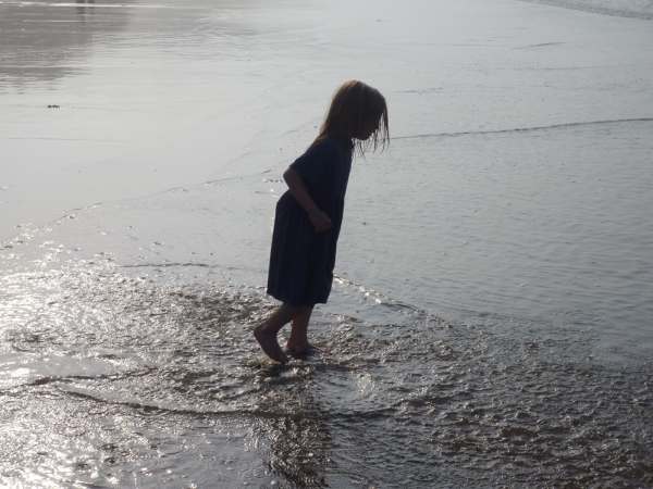 Contre-jour: Layla on Whitby beach. Wear a swimming costume next time!