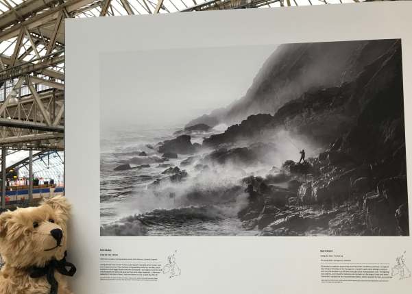 Landscape Photographer. Mick Blakey: Fisherman on the Rocks in Strong Westerly Winds, Porth Nanven, Cornwall, England.