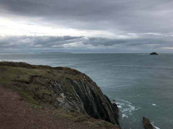 Walk from St David's: Grey forbidding clouds towards Skomer.