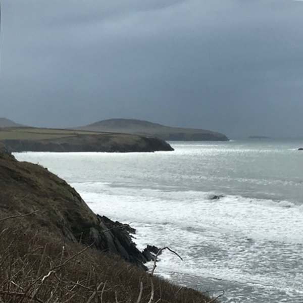 Walk from St David's: Rain coming. Ramsay Island furthest land. Near Whitesands.