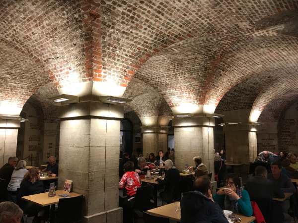 Tick tock. Eat Apple Crumble and Custard in a crypt. St Martin's in the Fields, London.