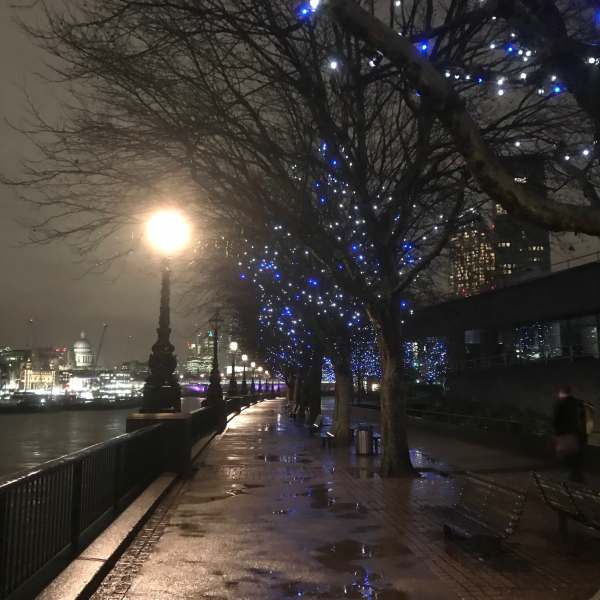 Tick tock. Walk in the rain. South Bank, River Thames, London.