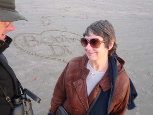 Tick tock. Love letters in the sand. West Wittering.