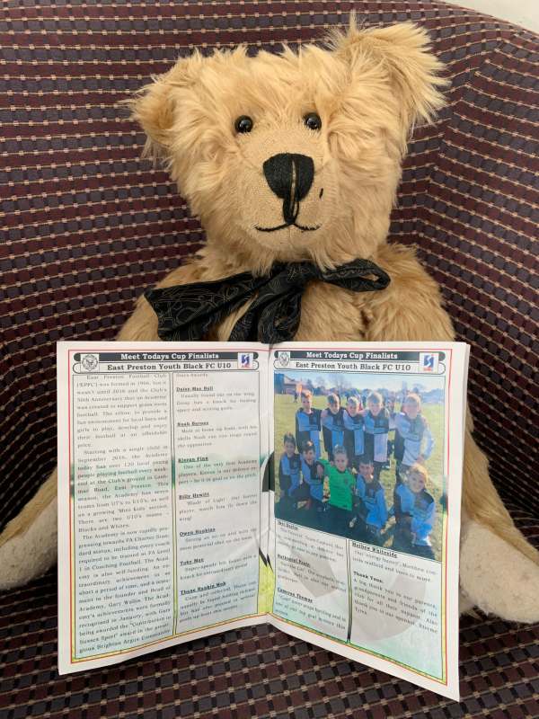 We Won the Cup: Bertie holding the programme.