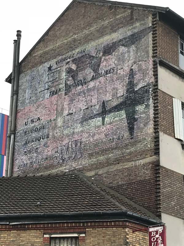 April in Paris: Nice ghost sign at La Courneuve.