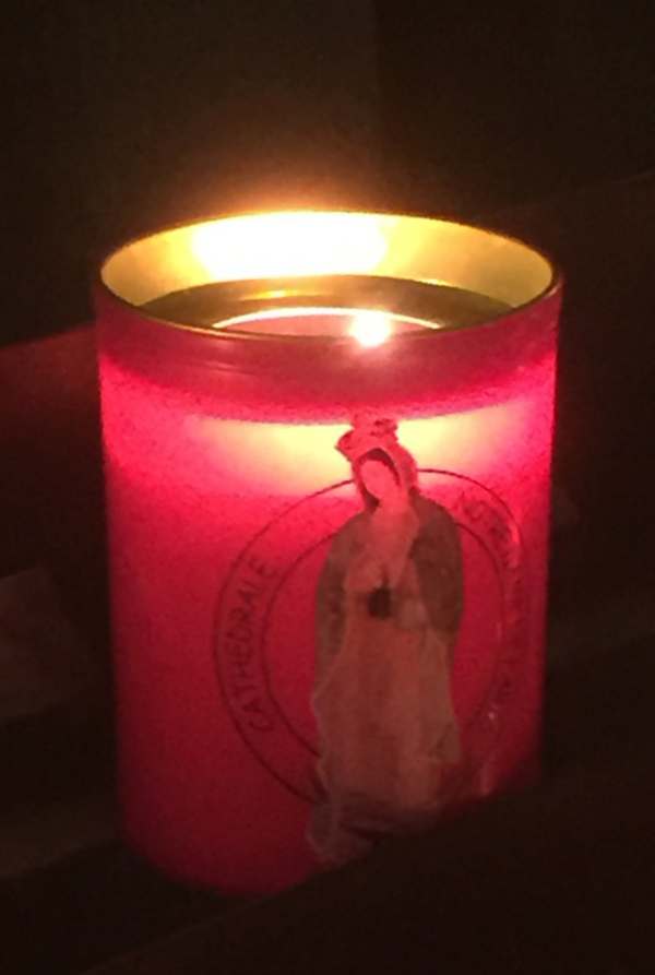 April in Paris: Our candle for Diddley - and Notre Dame.