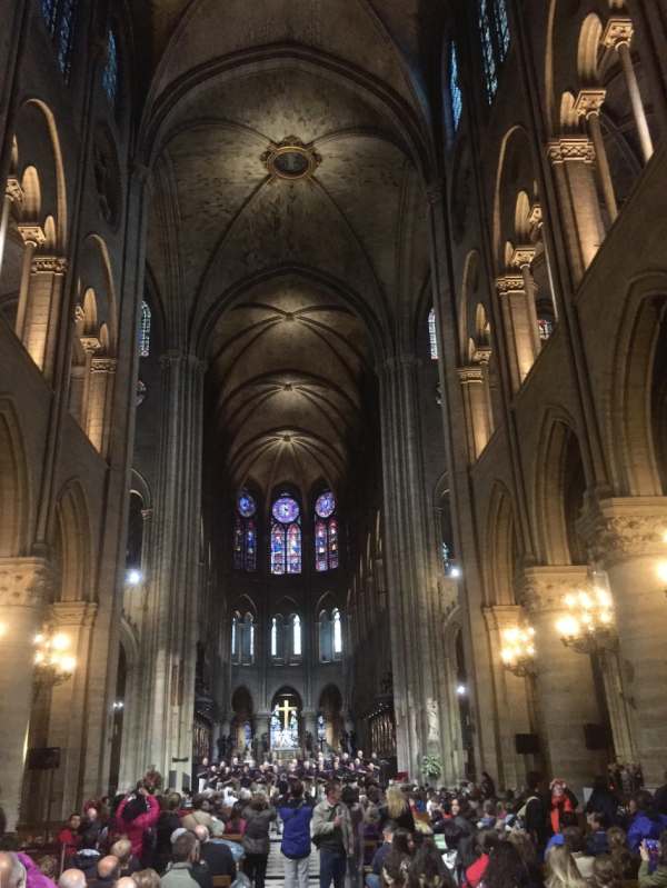 April in Paris: The magnificent nave, in happier times. The cross above the altar survived almost unscathed.