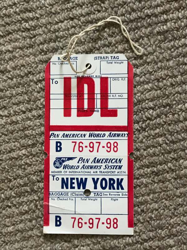 Tie on Baggage Labels: “IDL” stands for Idlewild . New York’s airport that was later renamed John F Kennedy in 1963.