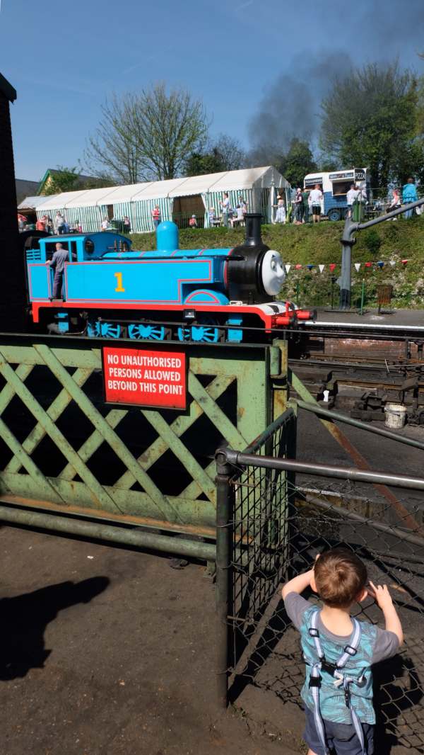 Little Jay getting dirty by the engine shed.