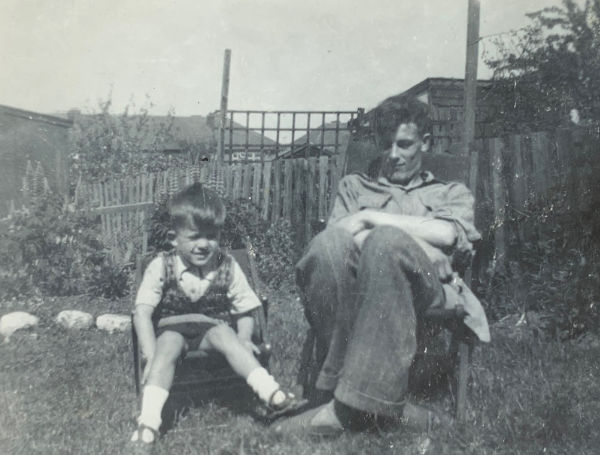 Bobby and his brother Tony sat side-by-side in deck-chairs in their back garden.