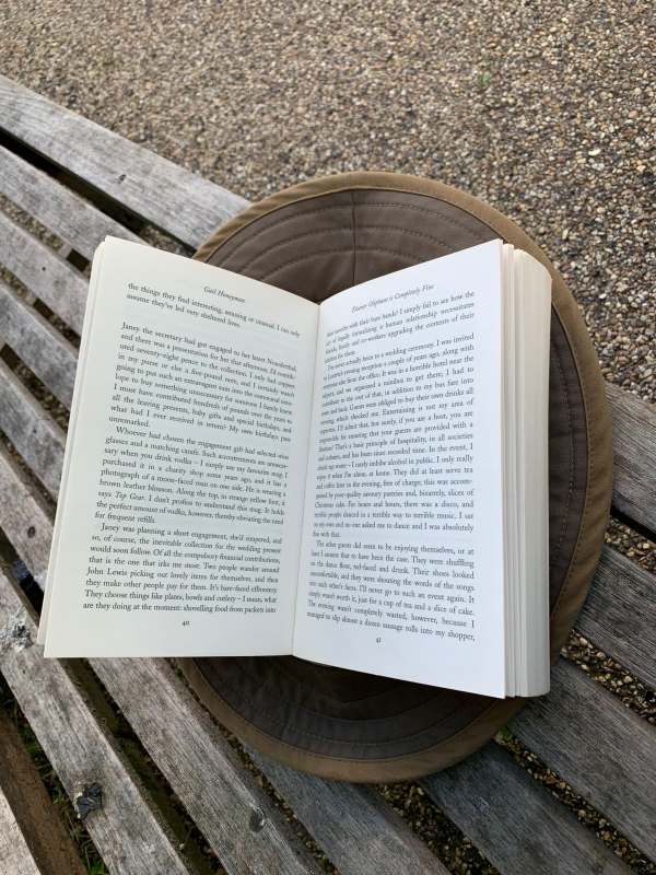 Photograph of Bobby's book open at pages 40 & 41, resting open in his hat. As far as he managed to read because of all the distractions.