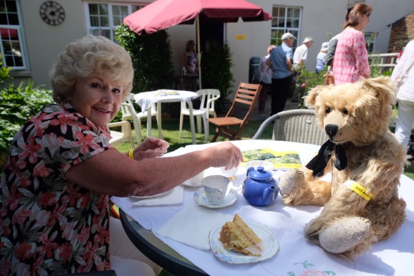 Bertie enjoying afternoon tea with Merrill.