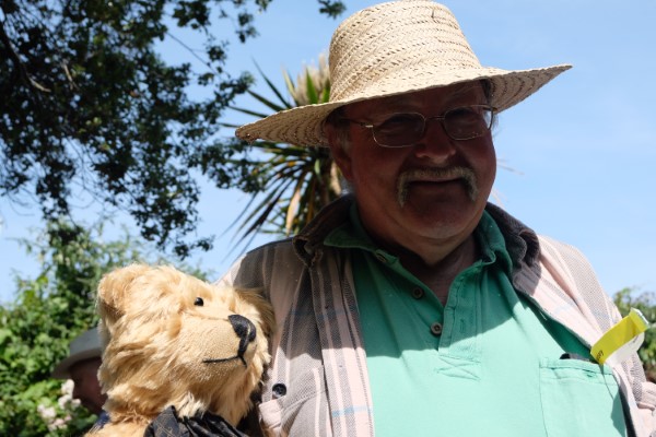 Rarity. A bloke wanting to have his picture taken with a bear.