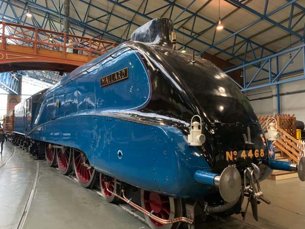 Mallard. A sleek, handsome streamlined steam locomotive. Deep blue, with gloss black front.