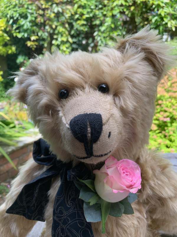 Bertie at Tommy's wedding - complete with pink rose buttonhole.