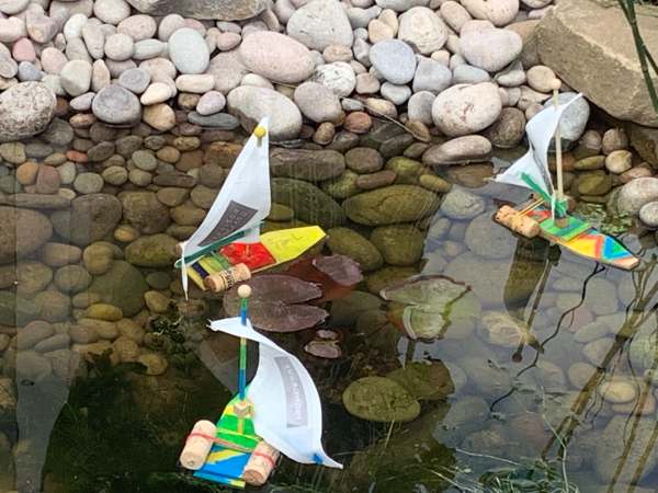Home-made yachts by children.