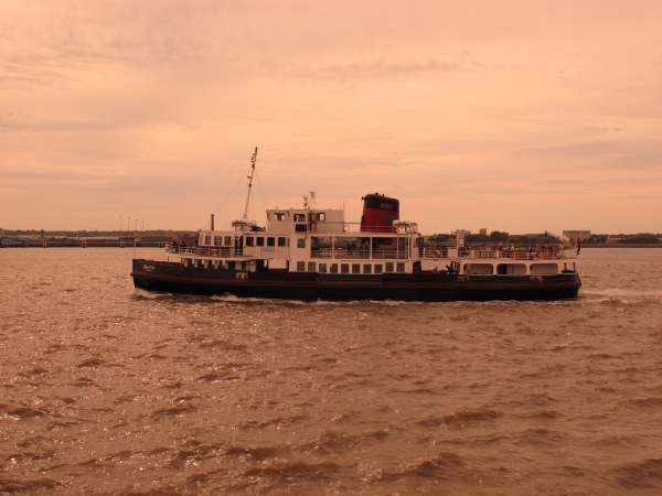 A Mersey Ferry in the evening sunlight heading back to Liverpool.