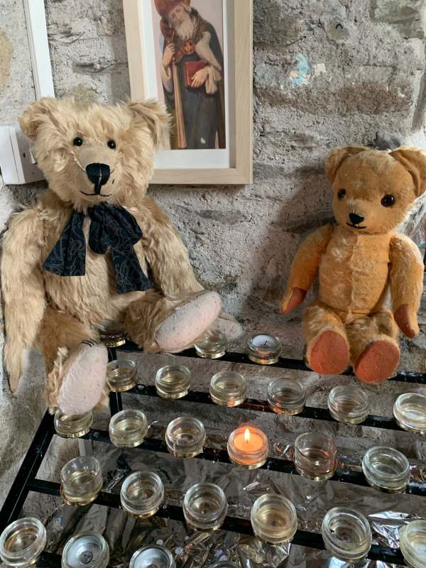 Lighting a Candle for Diddley and NHS Wales. Bertie & Eamonn, St Non's Chapel, St David's.