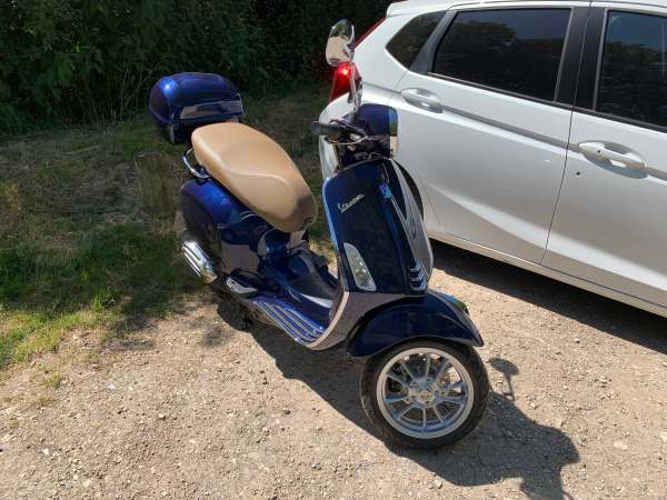 Blue scooter.