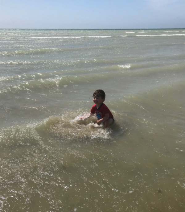 Little Jay playing in the sea at Worthing!