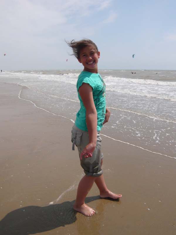 Jasmine about to go in the water at Camber Sands.