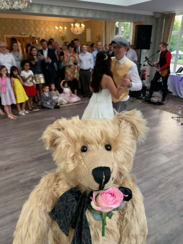 Bertie at the reception in front of the dance floor.