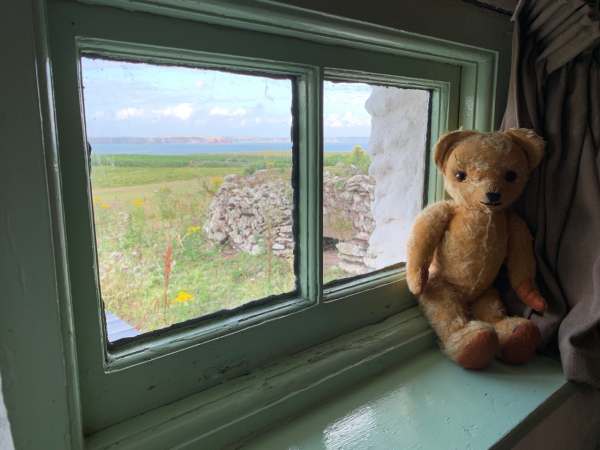 Eamonn sat on the windowsill admiring the view across Skokholm.
