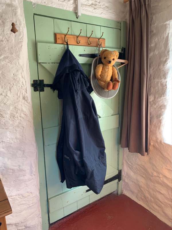 Eamonn hung up on the coat rack on the back of the bedroom door!