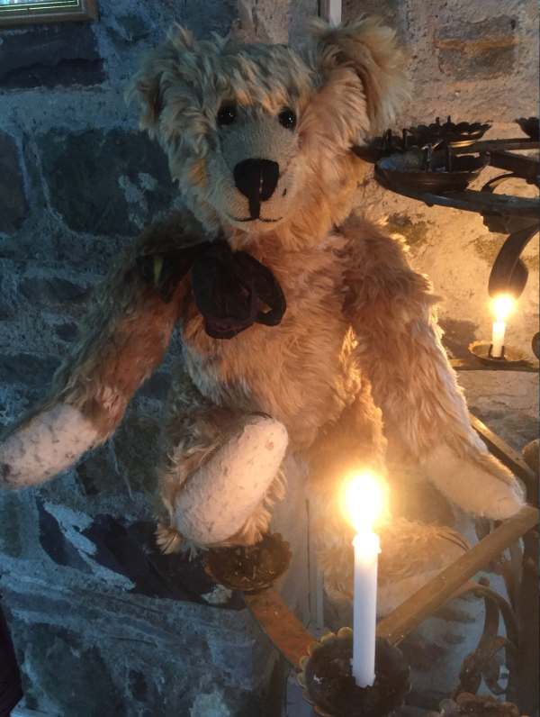 Bertie and a candle lit for Diddley in Pembrokeshire.