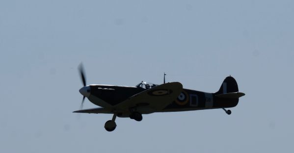Spitfire in the air at Duxford, 2019.