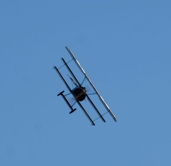 Sopwith Triplane banking high in the air as Duxford Airshow 2019.