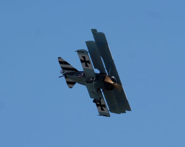 Fokker Triplane banking in the sky at the Duxford Airshow 2019.